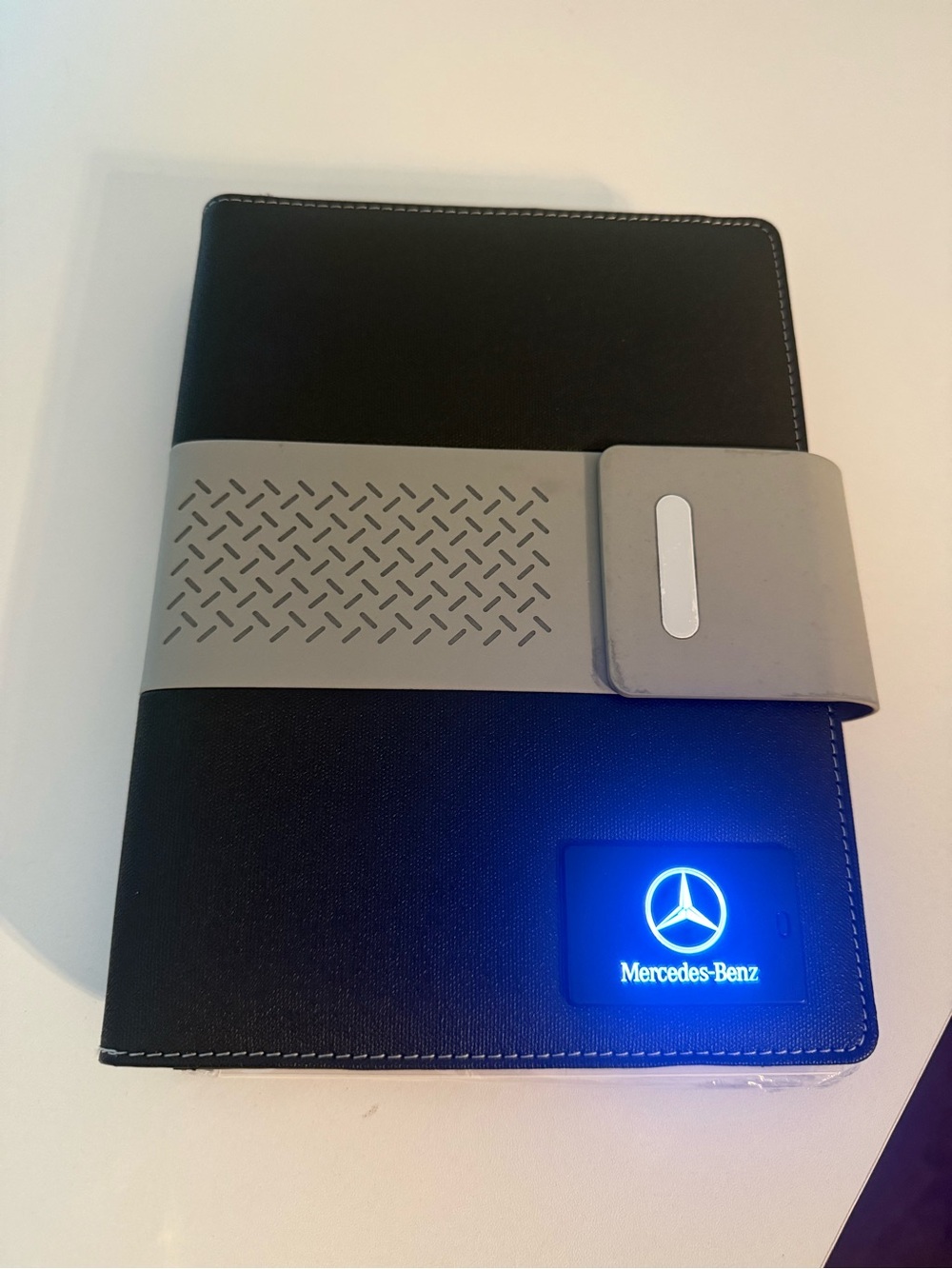 NWT. Luxurious Mercedes Benz notebook and power bank, padded case and LED Logo
